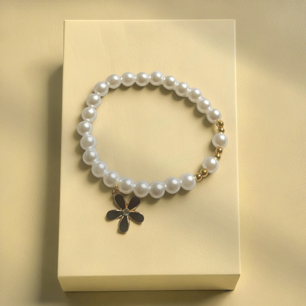 Pearl Bracelet with Gold accents and black and gold Flower Charm